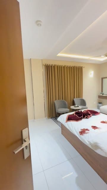 Luxury guest room at Marigold Hotel
