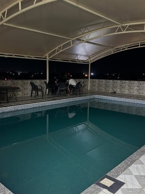 Pool terrace at Marigold Hotel